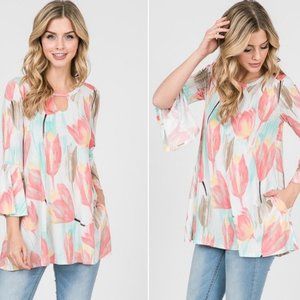 Belle Sleeve Tulip Top with pockets in size small
